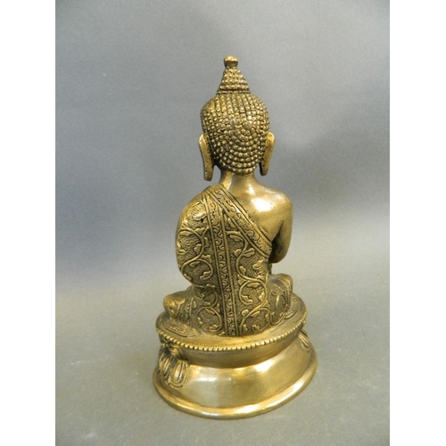 6 - A Chinese bronze figure of Buddha seated in meditation, 7