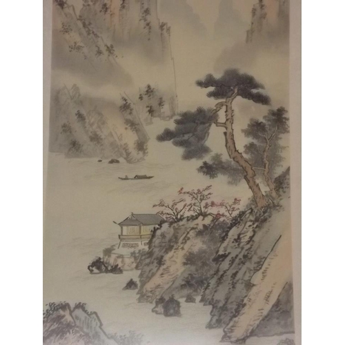 650N - A set of three Chinese prints on silk, mountainous landscapes with pagodas, 27