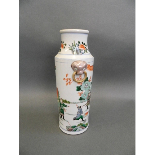 70 - A Chinese famille verte porcelain cylinder vase with enamelled decoration of warriors in training, w... 