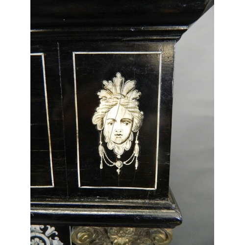 712 - A pair of C19th ebonised pier cabinets with brass mounts and bone inlaid decoration with penwork det... 