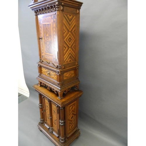 713 - A C19th Italian oak two section cabinet with parquetry inlaid panels and moulded and beaded decorati... 