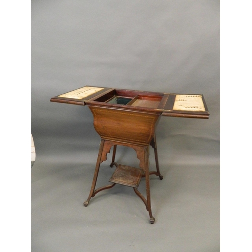 726 - An Edwardian inlaid mahogany work box with single drawer and top flaps opening to reveal a slide and... 