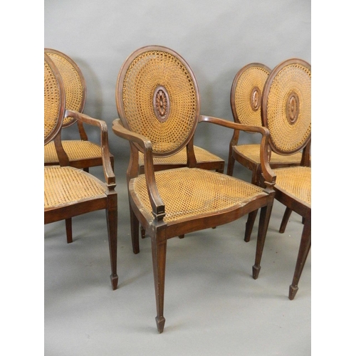 727 - A set of six C19th Adam style walnut dining chairs with serpentine front rails and carved patera dec... 