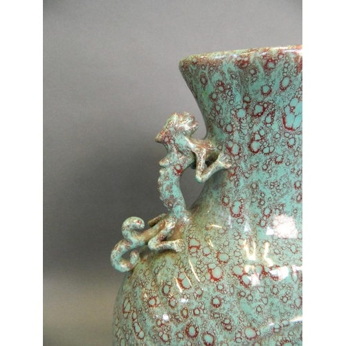 74 - A Chinese turquoise flambé glazed moonflask with twin dragon handles and ribbed decoration, seal mar... 