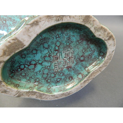 74 - A Chinese turquoise flambé glazed moonflask with twin dragon handles and ribbed decoration, seal mar... 