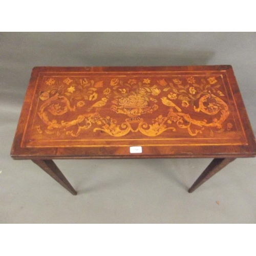 750 - A late C18th/early C19th Dutch mahogany card table with marquetry inlaid decoration of scrolls, flow... 