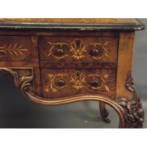 753 - A C19th figured walnut desk with fine boxwood inlaid decoration of scrolls, exotic birds and coronet... 