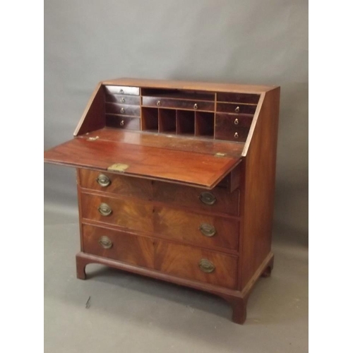 756 - A George III figured mahogany fall front bureau with fitted interior over four drawers, raised on br... 