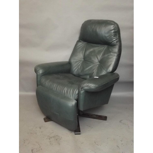 771 - A leather reclining and swivel chair with foot rest