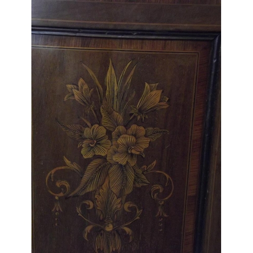 776 - A C19th figured mahogany demi-lune side cabinet with Adam style penwork inlaid decoration of swags, ... 