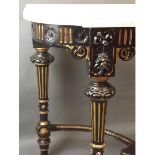 778 - A C19th ebonised and parcel gilt console table with crossed stretchers and undertier, and marble top... 