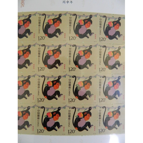 78 - An album of facsimile Chinese Limited Edition stamps commemorating the 'Year of the Monkey', 8½