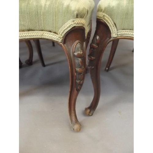 796 - A set of four Victorian walnut balloon back chairs, and a similar pair