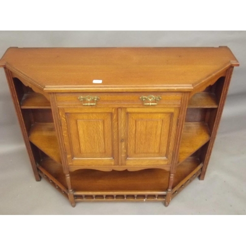 814 - A Victorian golden oak side cabinet with open ends and galleried undertier, 47