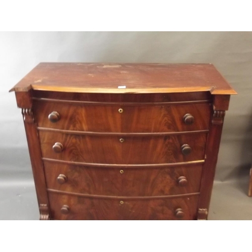 840 - A Victorian figured mahogany bow fronted chest of four long drawers with corbelled decoration, raise... 