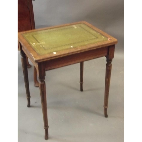 841 - A 1920s walnut drop leaf pot cupboard, and a small occasional table with leather inset top, 14