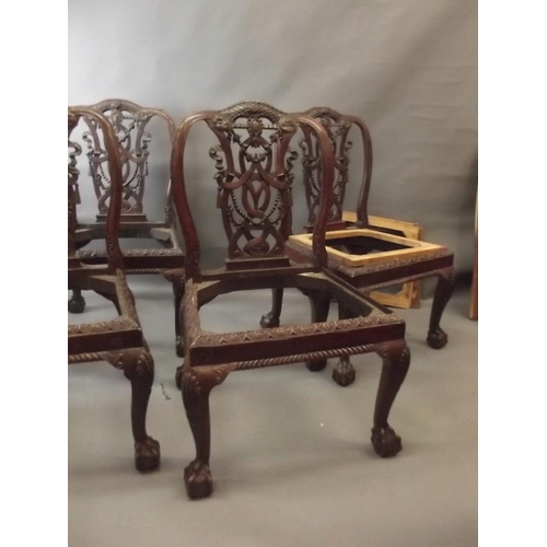 845 - A set of four Colonial Chippendale style standard chairs with carved and pierced splat backs, raised... 