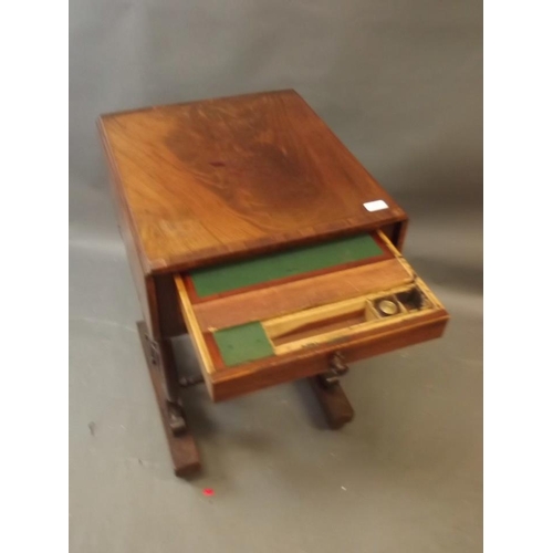 880 - A C19th figured mahogany drop leaf work table with two drawers and sliding basket, the top drawer wi... 