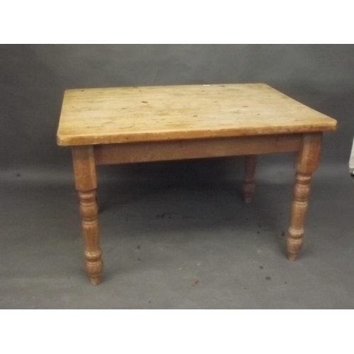 893 - A pine scullery table raised on turned supports, detachable, 48