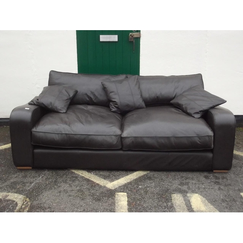 894 - A Contemporary soft brown leather settee, 89