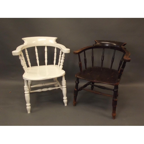 897 - A Victorian elm smoker's bow elbow chair, and another similar but painted