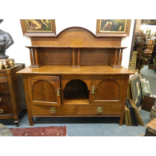 905 - An Arts & Crafts inlaid oak dresser, the dome topped upper section and shelf supported by columns ov... 