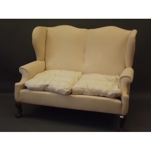 907 - A C19th Georgian style wing back two seater settee, 59