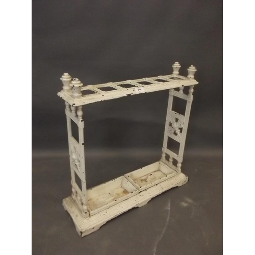 918 - An Edwardian painted cast iron twin division stick stand, 26