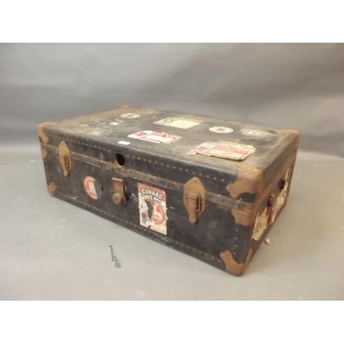 919 - A vintage steamer trunk with Cunard White Star Line label, 21