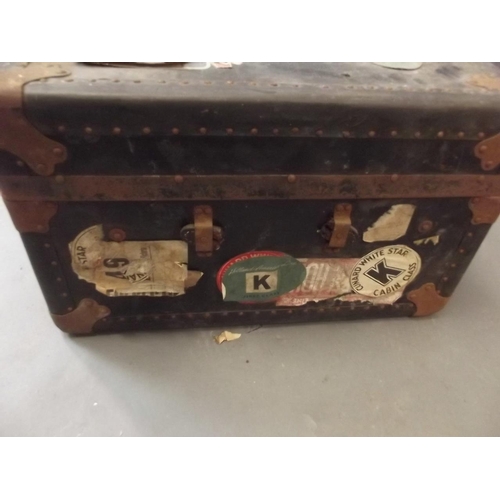 919 - A vintage steamer trunk with Cunard White Star Line label, 21