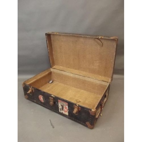 919 - A vintage steamer trunk with Cunard White Star Line label, 21