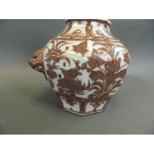 94 - A Chinese Ming style red and white porcelain vase with twin kylin mask handles and painted waterfowl... 