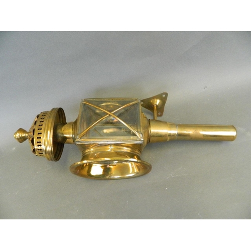 1 - A brass and glass coaching lamp with spirit burner, 17½