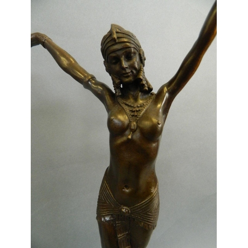 100 - A bronze figure of a dancer in Egyptian costume, after Chiparus, the base marked 'D.H. Chiparus', wi... 