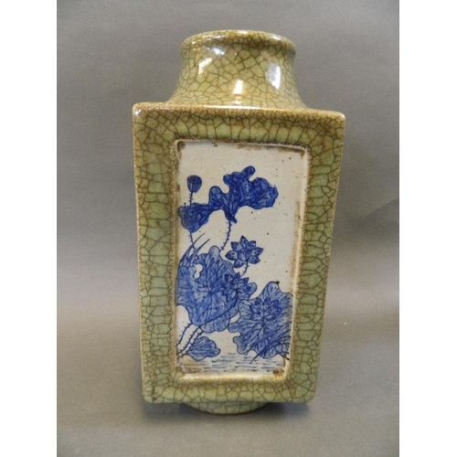 113 - A Chinese porcelain square section vase with green crackle glaze and panes of blue and white floweri... 