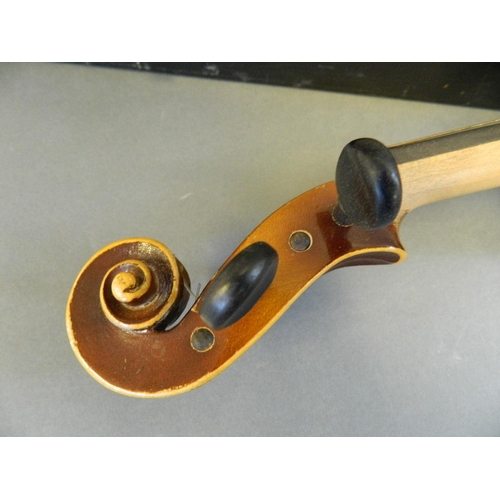 122 - An Italian violin with two piece back, bears label inside, together with a bow and wooden case, 23