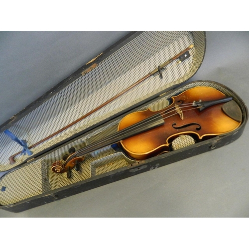 122 - An Italian violin with two piece back, bears label inside, together with a bow and wooden case, 23