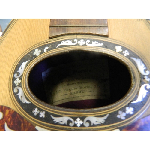 130 - An eight string rosewood mandolin with inlaid decoration by 'Luigi Vicentini, Naples', in a fitted c... 