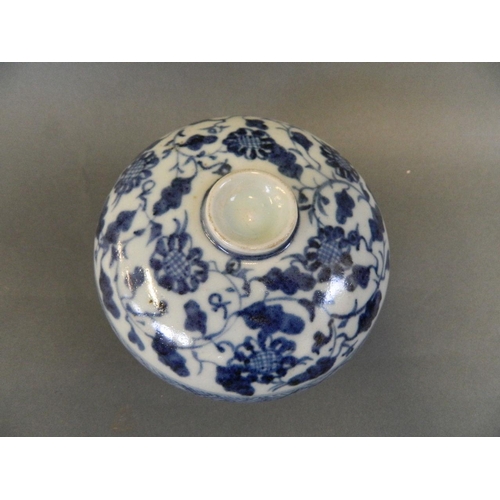 131 - A Chinese blue and white porcelain jar and cover with scrolling floral decoration, 5