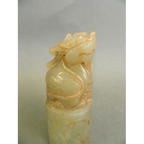 133 - A Chinese celadon jade seal with a carved knop in the form of Longgui, 3