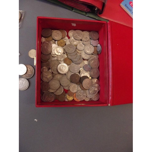 134 - A large collection of coins, British and World, to include crowns, half crowns, 5 pound coins, Royal... 