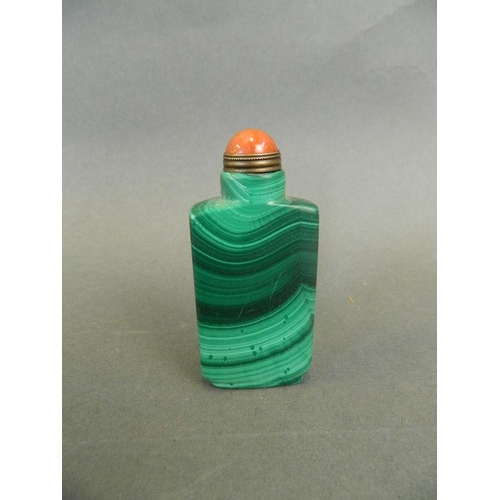 140 - A Chinese carved malachite snuff bottle, 2½