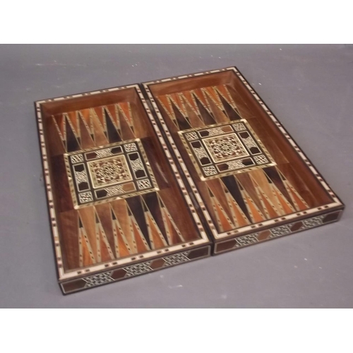 142 - A Damascan inlaid chessboard topped box, opening to reveal a backgammon board, 10