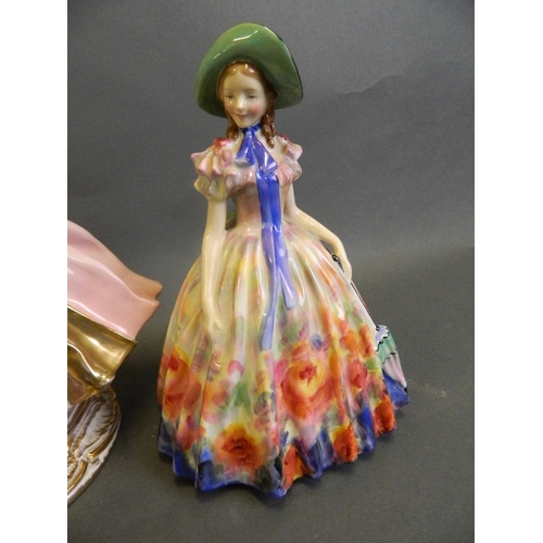 150F - Three Royal Doulton figures, 'Easter Day' no. 842489, 'Sweet Linne' no. 743560 HN14, and 'Janet' no.... 