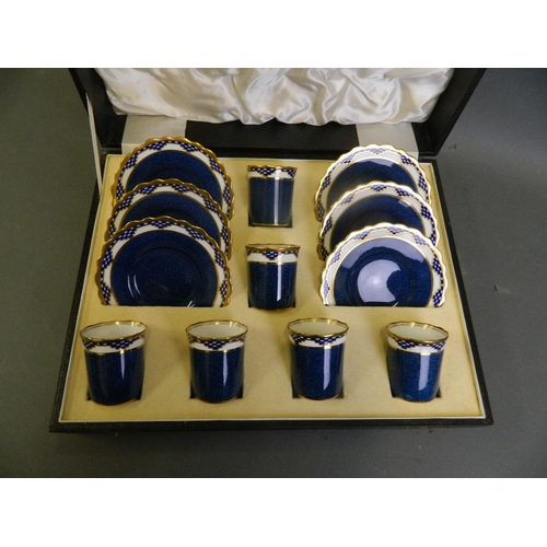 150H - An Aynsley porcelain cabaret set with blue glaze decoration and gilt highlights