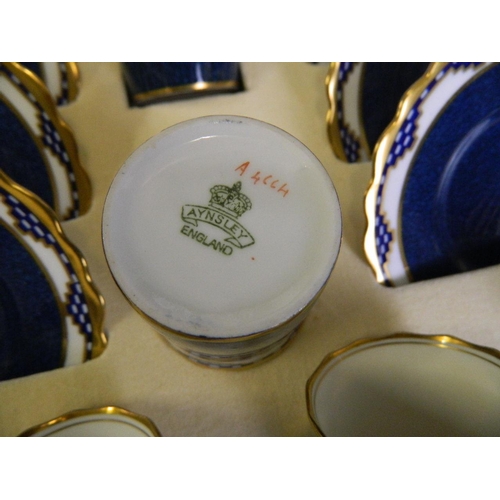 150H - An Aynsley porcelain cabaret set with blue glaze decoration and gilt highlights