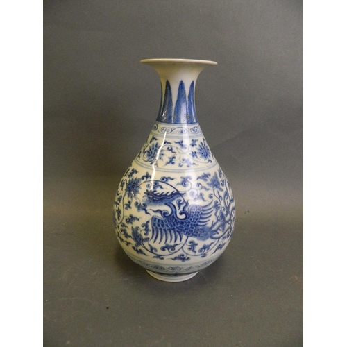 150K - A Chinese blue and white porcelain pear shaped vase with phoenix and scrolling lotus flower decorati... 