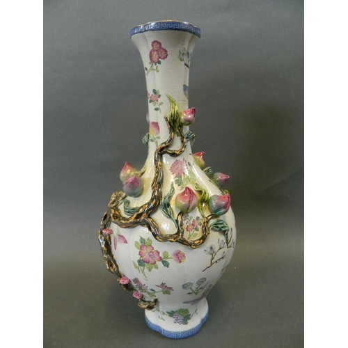 162 - A Chinese polychrome enamel porcelain vase with bulbous body and slender neck, decorated with a frui... 