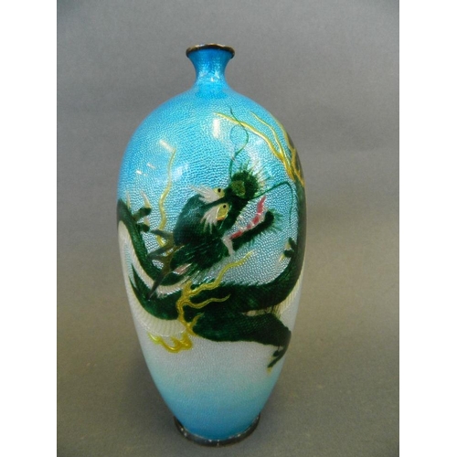 178 - A Japanese ginbari style enamelled porcelain vase decorated with a brightly coloured dragon on a blu... 