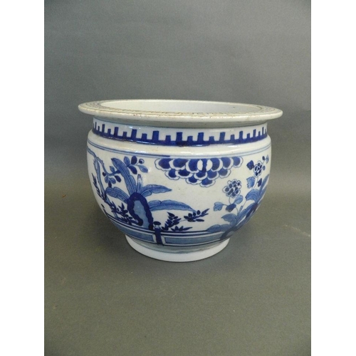 18 - A Chinese blue and white porcelain jardinière decorated with figures in a garden, 10